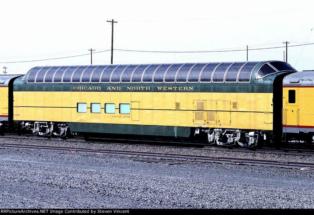 Chicago & Northwestern dome CNW #421 on UP 3985 excursion.